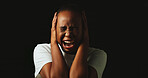 Woman, screaming and sad with stress in studio, panic or mental health by black background. African person, anxiety and shouting with depression, frustrated or mockup space with trauma, ptsd and dark