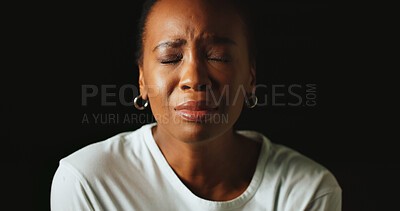Buy stock photo Closed eyes, sad and black woman in studio, crying and mental health on dark background. African person, mockup space or model with tears, anxiety and depression with grief, upset or stress with loss