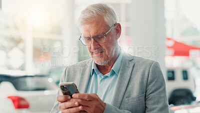 Buy stock photo Businessman, smile and typing with phone for dealership, reading and website for car rental service. Showroom, mature person and seller with mobile for inventory information, vehicle shop and scroll
