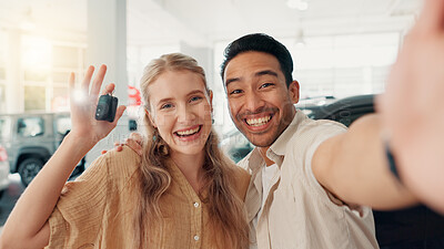 Buy stock photo New car, face or happy couple in selfie with keys at dealership for purchase success, picture or buyer. Vlogging, social media post and excited customers with smile for photograph or rental agreement