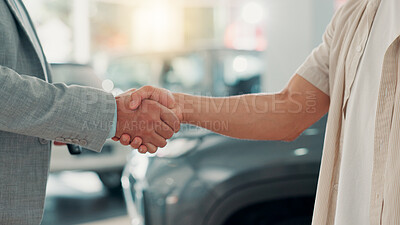 Buy stock photo Handshake, salesman and customer with keys in car dealership, test drive and success purchase of motor. Showroom, people and agreement in closeup after buying vehicle, rental service or shaking hands