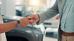 Dealership, businessman and customer with hands for car keys, test drive and success purchase of motor. Showroom, people and giving equipment in closeup for buying vehicle, rental service and seller
