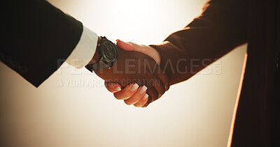 Buy stock photo Handshake, meeting and welcome with business people in studio for agreement or b2b deal. Contract, partnership and thank you with corporate employee team shaking hands for greeting on wall background