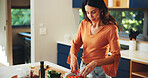 Meal prep, woman and salad with vegetables in kitchen for dinner recipe, vegetarian dish and nutrition. Nutritionist, ingredients and fresh tomato in home for brunch cuisine, vegan food and wellness