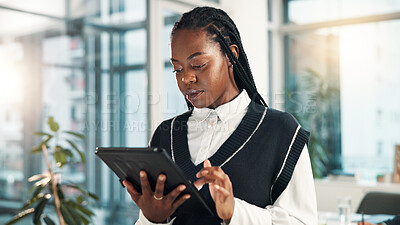 Buy stock photo Reading, business and black woman on tablet in office for networking, connection and research for investment. Company, professional and worker on digital tech for website, finance report and planning