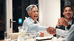 Handshake, applause and business people in meeting with success, and winning finance deal at night. Team, shaking hands and mature woman at financial seminar with celebration, achievement and funding