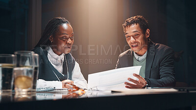 Buy stock photo Discussion, paperwork and business people at night meeting for overtime, planning or research. Creative startup, late collaboration or man with woman for project, proposal and brainstorming in office