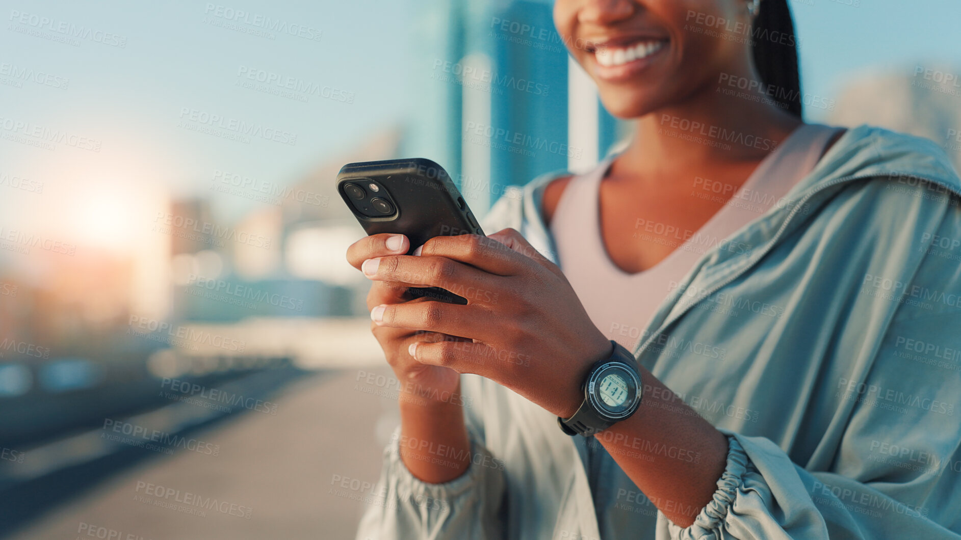Buy stock photo Happy woman, hands or fitness with phone in city for workout app, performance or chat. Closeup, female person or user with smile on mobile smartphone for exercise routine or schedule in an urban town