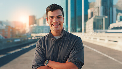 Buy stock photo Arms crossed, fitness and portrait of man on bridge in city for cardio workout or marathon training. Exercise, smile and sports with happy athlete or runner outdoor in urban town for challenge