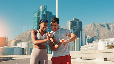 Buy stock photo Happy team, fitness and checking watch with tracker app for workout results or performance in city. Man, woman or runners with smile or wristwatch for health, calories or exercise goals in urban town