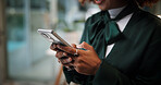Business woman, cellphone and hands typing in office for communication, contact or fashion inspiration. Female designer, tech and scroll for design feedback, social media and search on internet