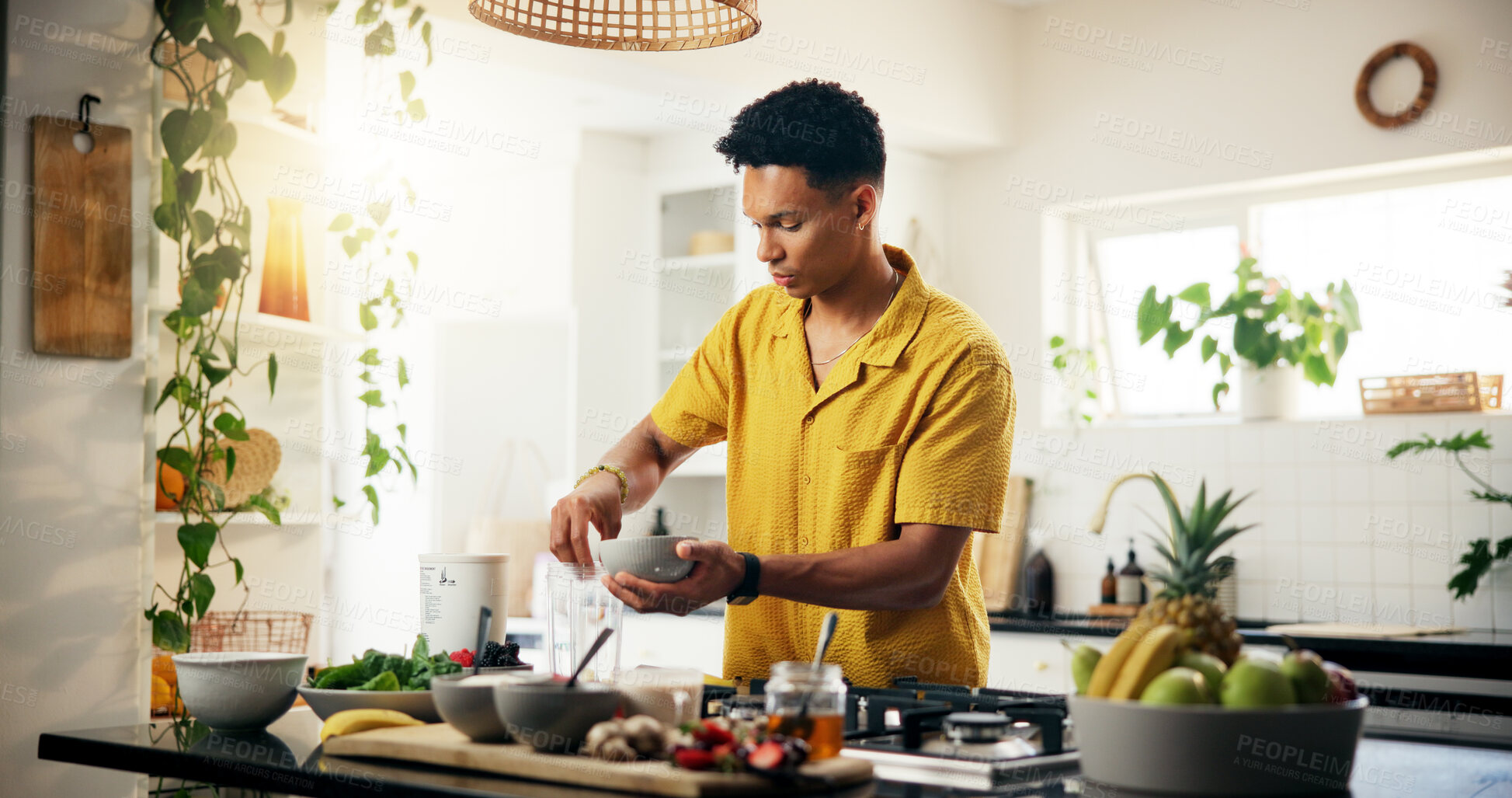 Buy stock photo Cooking, concentration and ingredients with man in kitchen of home for hobby, meal prep or nutrition. Passion, recipe and spices with person in apartment for diet, health or supper as culinary chef