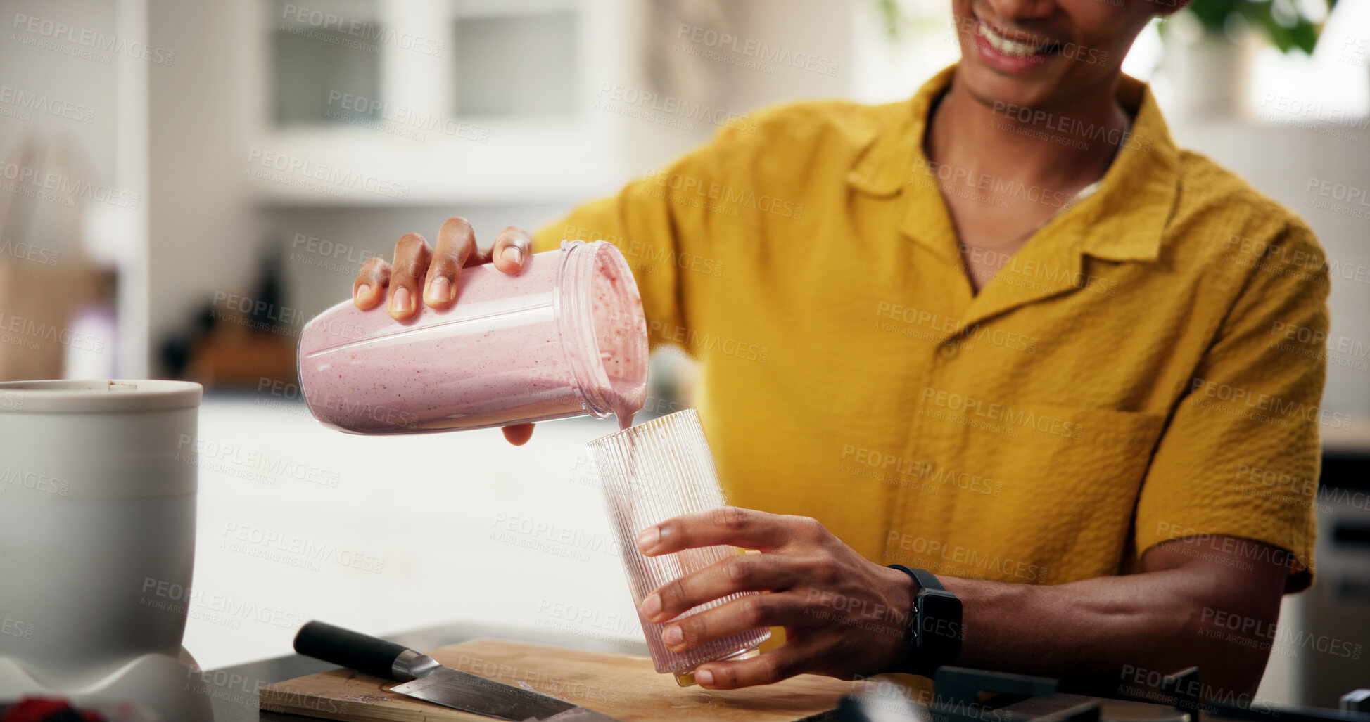 Buy stock photo Blender, nutrition and man in kitchen in home for liquid diet with breakfast, health or wellness. Beverage, detox and male person with fruit smoothie for vitamins, snack or protein shake in apartment