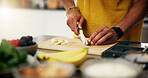 Cooking, hands and cut banana in kitchen for meal preparation, healthy salad and lunch recipe. Nutrition, closeup and person with fresh fruit ingredients in home for vegetarian snack and organic diet