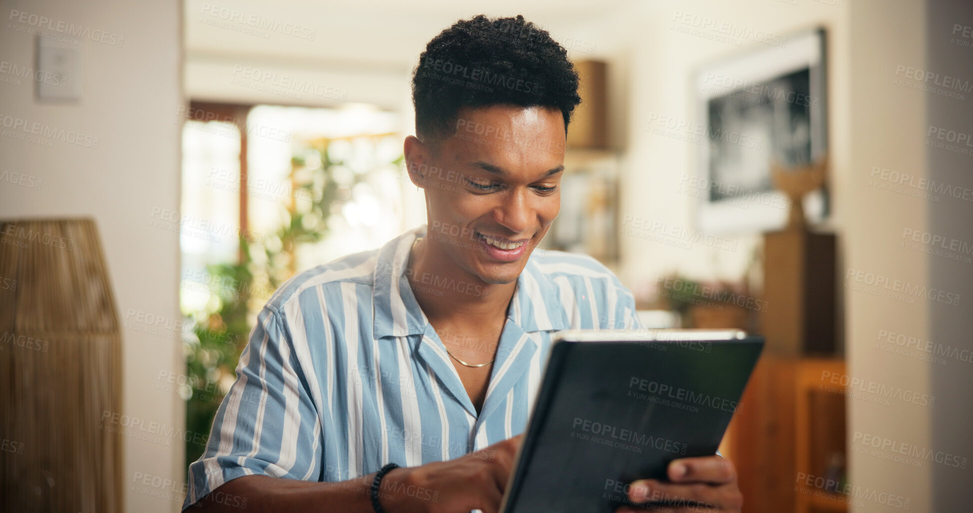 Buy stock photo Tablet, freelancer and scroll with man in home for virtual assistant, schedule appointment and admin platform. Remote worker, calendar update and research with person for feedback and newsletter