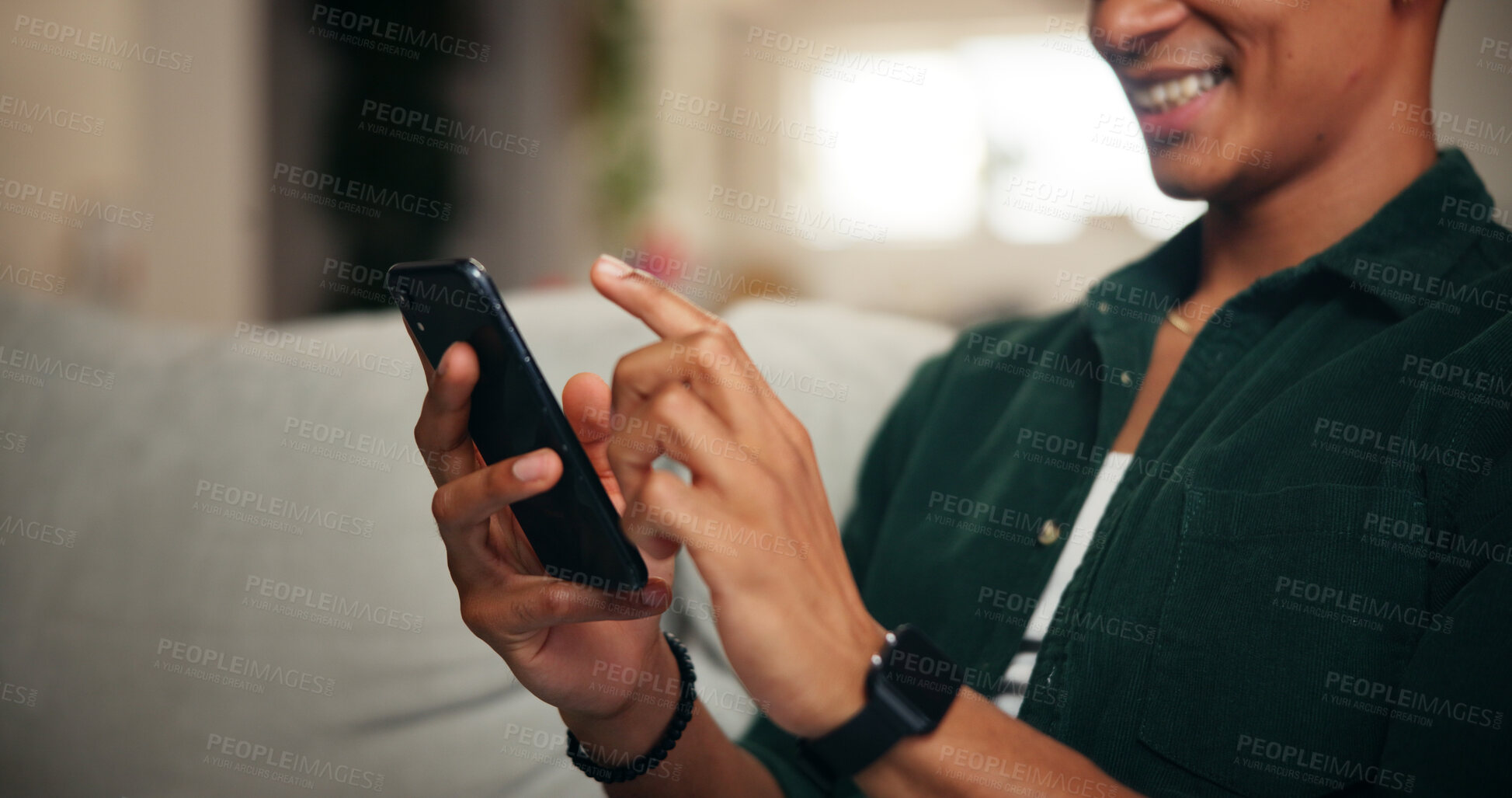 Buy stock photo Relax, hands and phone with man on sofa for social media, movie platform and streaming service. Happiness, entertainment app and subscription with person in living room at home for multimedia search