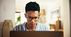 Man, reading and laptop for remote work at house for research, proofreading article and information. Journalist, online and review news for story update, editing draft and schedule for publication
