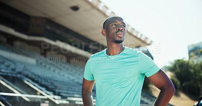 Buy stock photo Black man, athlete and thinking on track, stadium and rest for competition, tired or exercise in summer. African person, runner and perspective for training, workout and fitness with break in Nigeria
