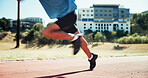 Athlete, feet and running on track for race, motion blur and competition for speed record in summer. Person, legs and shoes on circuit, fast and exercise for contest with fitness at sports club