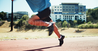 Buy stock photo Athlete, feet and running on track for race, motion blur and competition for speed record in summer. Person, legs and shoes on circuit, fast and exercise for contest with fitness at sports club