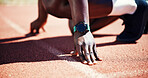 Person, hands and runner ready at starting line for race, sprint or new record time at stadium. Closeup, athlete or fitness with wrist watch for sport marathon, beginning challenge or competition