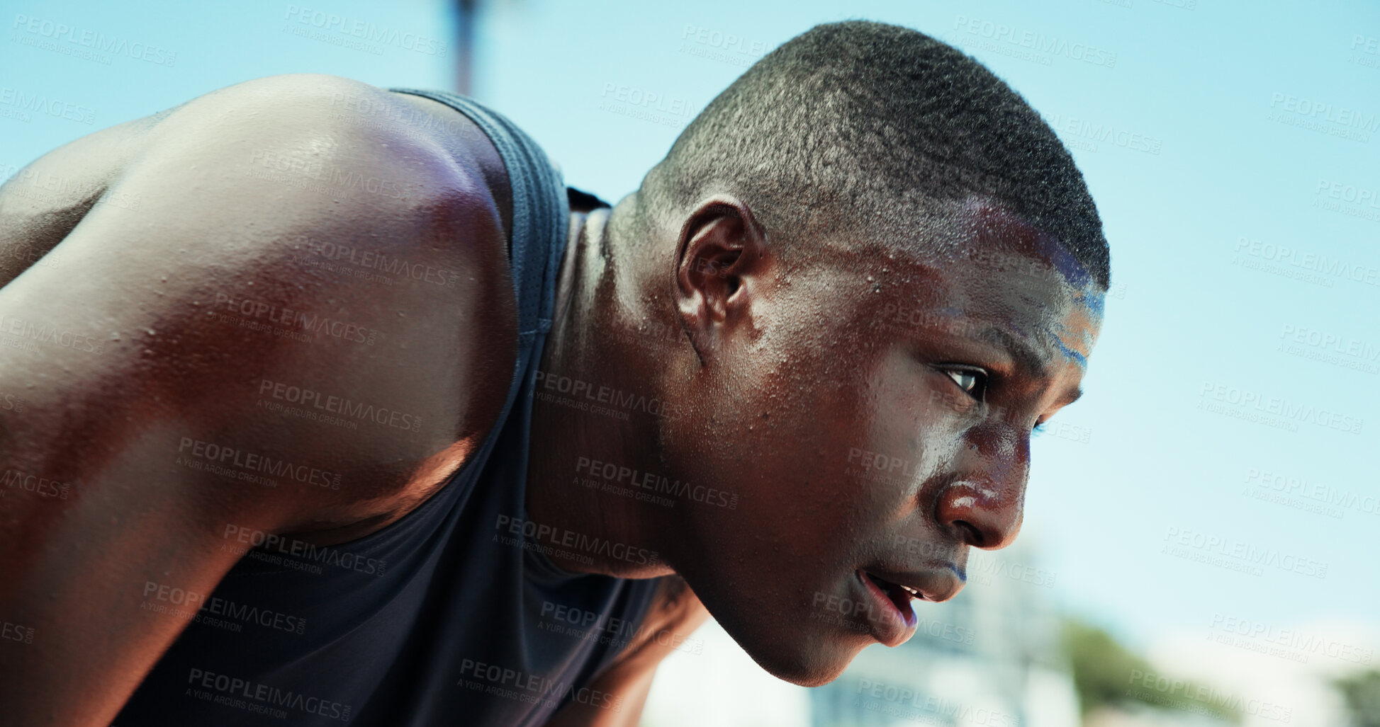 Buy stock photo Runner, black man and tired with sweating at stadium for race competition, endurance challenge and breathing. Fitness, athlete and sports fatigue outdoor for running recovery, burnout or workout rest
