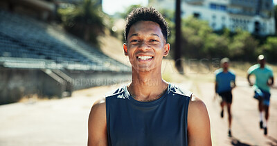 Buy stock photo Portrait, active and black man with smile at stadium for exercise, sports training and practice on track field. Male runner, happy and pride for fitness, workout and endurance of marathon competition