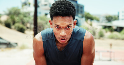 Buy stock photo Runner, man and tired with breathing at stadium for race competition, endurance challenge or sweating. Fitness, athlete or sports portrait with fatigue for running recovery, exhausted or workout rest