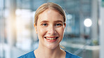 Medical, portrait and smile of woman nurse in hospital for appointment, treatment or welcome. Happy, healthcare and scrubs with medicine professional in clinic for checkup, medicare or therapy