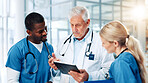Medical, tablet or training with doctors and nurses in hospital together for discussion or report. Collaboration, healthcare and mentor with professional medicine team in clinic for diagnosis review
