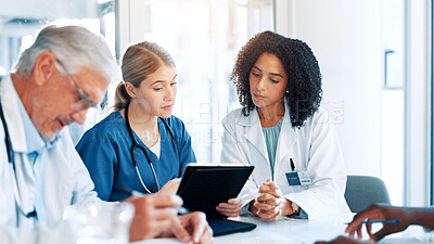Buy stock photo Tablet, meeting and team of doctors in hospital boardroom with medical report for treatment planning. Digital technology, research and group of healthcare workers with surgery schedule in clinic.