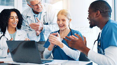 Buy stock photo Doctors, woman and team with applause, laptop and support with goals, results and celebration. People, group and men with nurse for success, promotion or achievement in career with cheers at hospital