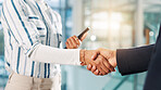Shaking hands, partnership and business people in office with deal, negotiation or contract. Collaboration, closeup and financial manager with client for agreement, welcome or thank you handshake.