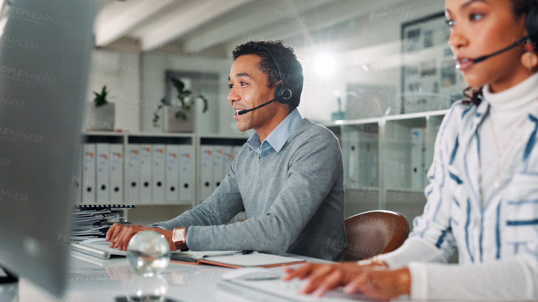 Buy stock photo Computer, contact us and support with man in call center for assistance, feedback or online help. Communication, consulting and headset with virtual assistant at desk in office for customer service