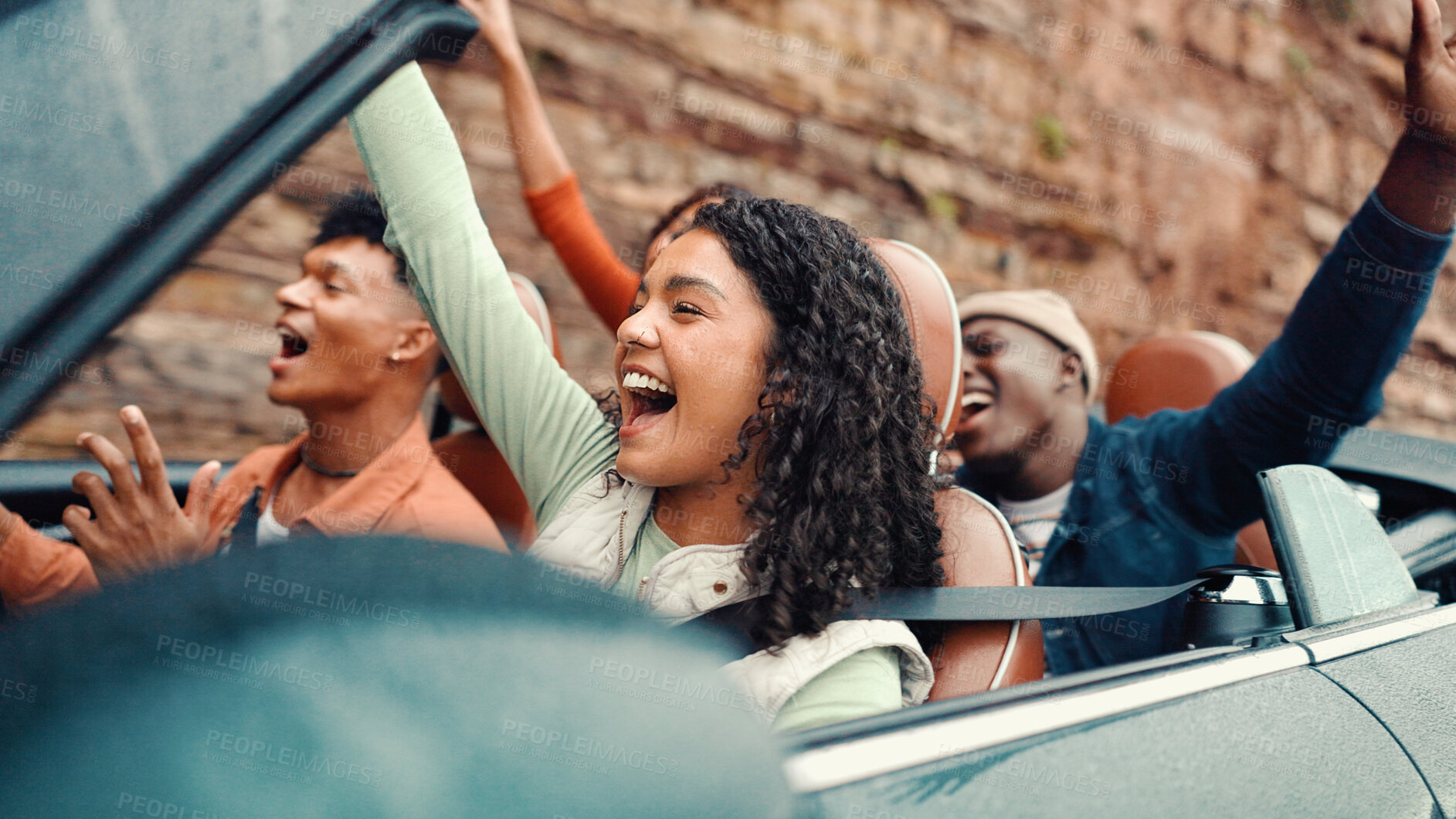 Buy stock photo Dance, freedom and road trip with happy friends in car together for holiday, travel or vacation. Energy, excited and music with group of people riding in convertible vehicle for weekend getaway