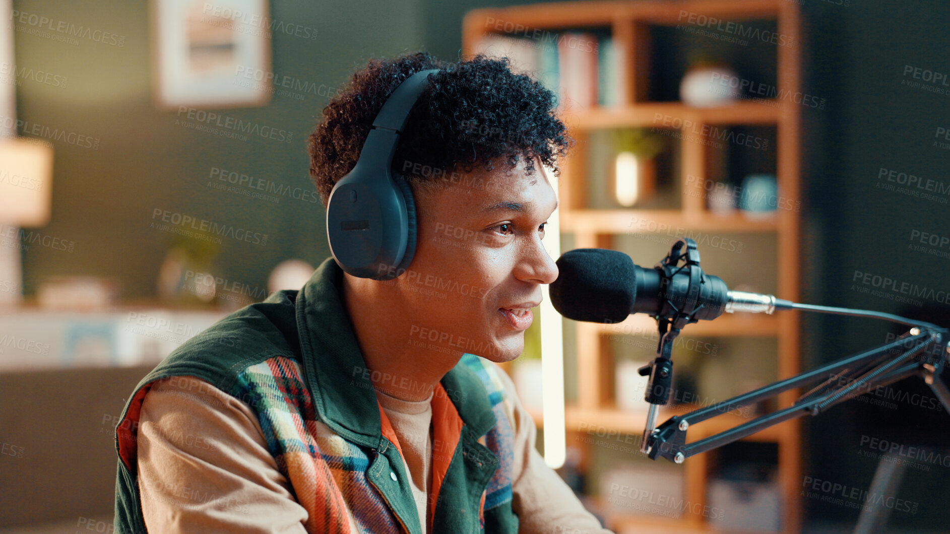 Buy stock photo Happy man, podcaster and home with mic or headphones for audio podcast or radio channel. Male person, announcer or broadcast with sound on air for live recording, news announcement or streaming