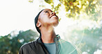 Thinking, hiking and black woman with nature, smile and wellness for hobby, explore and travel. Outdoor, hiker and happy person with woods, vacation activity and sightseeing for environment and break
