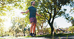 Fitness, jump rope and health with man in park for cardio workout, wellness and energy. Challenge, lose weight and skipping movement with person outdoor for exercise, sports training and wellness
