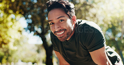 Buy stock photo Tired, running and portrait of man in nature for cardio workout, exhausted and training break. Smile, health and fitness rest with person outdoor for fatigue, sports athlete and marathon practice