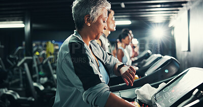 Buy stock photo Runner, smart watch and fitness with woman on treadmill for speed timer, workout and training stats. Performance tracking, cardio and wellness with mature person on running machine for endurance