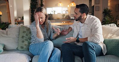 Buy stock photo Couple, fight and ignore on sofa in home for discussion, headache or stress with relationship. People, man and woman with migraine, frustrated and talk for anger with conflict on couch in living room