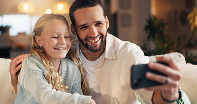 Buy stock photo Father, girl and hug with selfie on couch, memory and happy with care, love and bonding in family home. Dad, child and people with photography, profile picture and embrace for social media at house