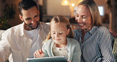 Buy stock photo Home, parents and girl with tablet, smile and bonding together with online reading. Happy family, apartment and father on sofa, mother and daughter with tech, internet and help with app for learning