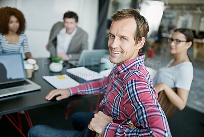 Buy stock photo Man, office and portrait with team at desk for meeting with strategy for political campaign with smile. Collaboration, working and laptop with plan for efficiency with workforce in Germany with pride