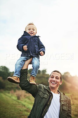 Buy stock photo Dad, child and portrait of lifting in nature with happy laugh, fun bonding and outdoor garden. Father, son and playful support in backyard together for growth, development and energy, smile and care.