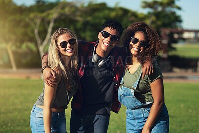 Buy stock photo Happy, friends and portrait of hug in park, outdoor or relax on vacation in summer. People, smile and embrace together on holiday with students at college, university or fashion on campus in USA