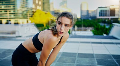 Buy stock photo Woman, athlete and breathing after run with city background for fitness, health and exercise in town for summer. Female person, runner and training in urban for marathon, competition and wellness