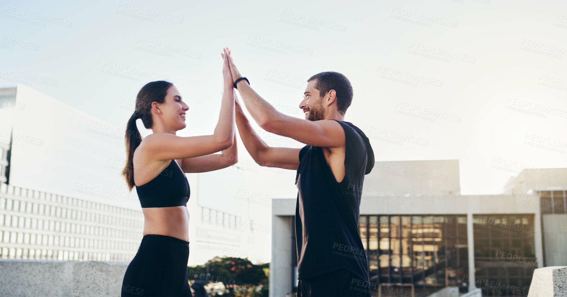 Buy stock photo Man, woman and high five for fitness in city, workout and exercise with partnership for training. Friends, teamwork and male personal trainer outdoor for wellness, success and teamwork in New York 