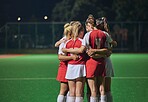 Huddle, soccer teamwork or football women on soccer field or stadium at night for support, motivation or workout game. Fitness, wellness or sports health trust, game partnership or planning on field