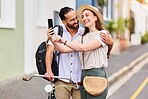 Outdoor, couple and selfie with bicycle on holiday, vacation adventure and tourists with photography. Happy people, man and woman with hug, document experience and bonding on honeymoon trip in France